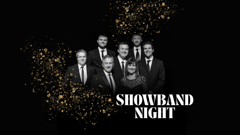 Guests enjoy an elegant showband night with musicians in suits, surrounded by sparkling gold confetti.
