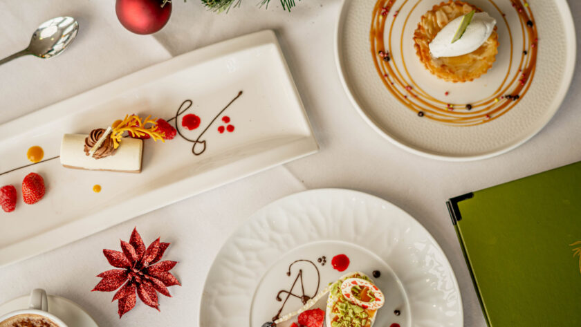 Festive hotel dining with elegant desserts and decor, perfect for a luxurious culinary experience.